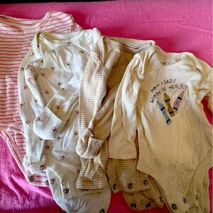 Four long sleeve carters onesie for newborn’s.